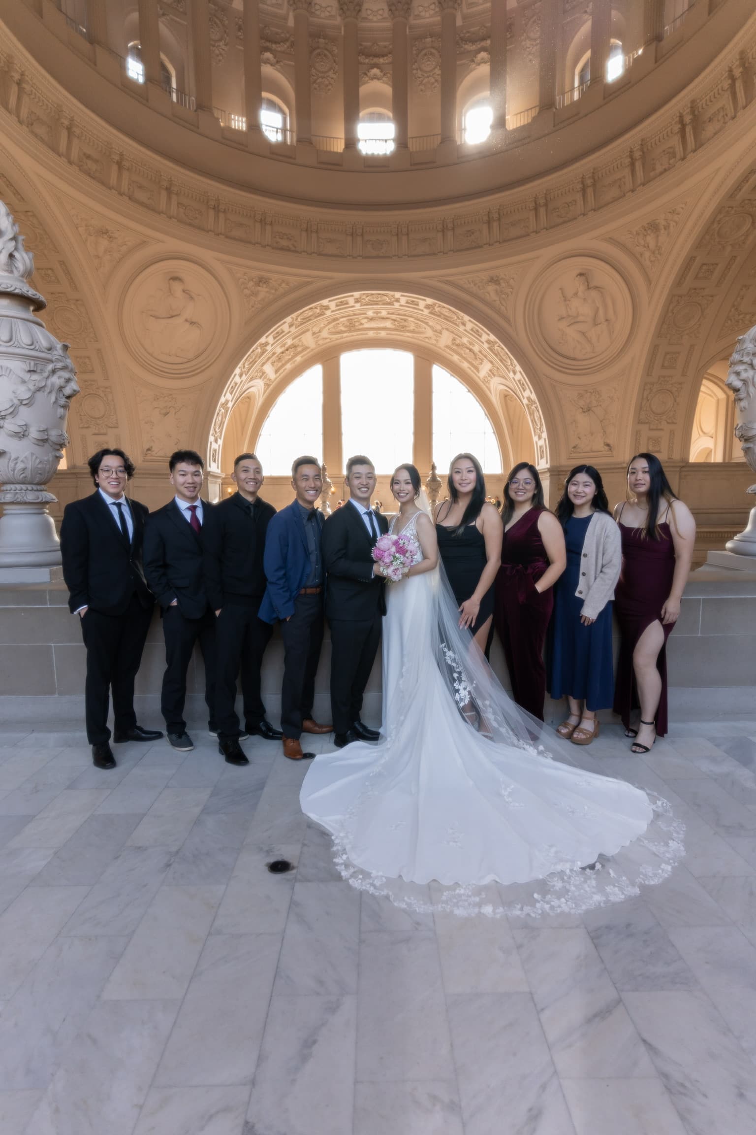 Wedding party portrait beneath the rotunda dome